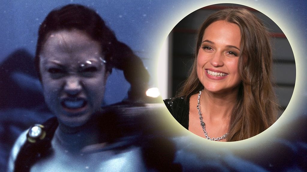 Kuvassa Angelina Jolie Lara Croftina. Kuvassa myös näyttelijä Alicia Vikander.