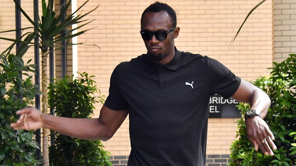 Usain Bolt oli letkeällä tuulella poseeratessaan kuvaajille torstain lehdistötilaisuuden jälkeen.