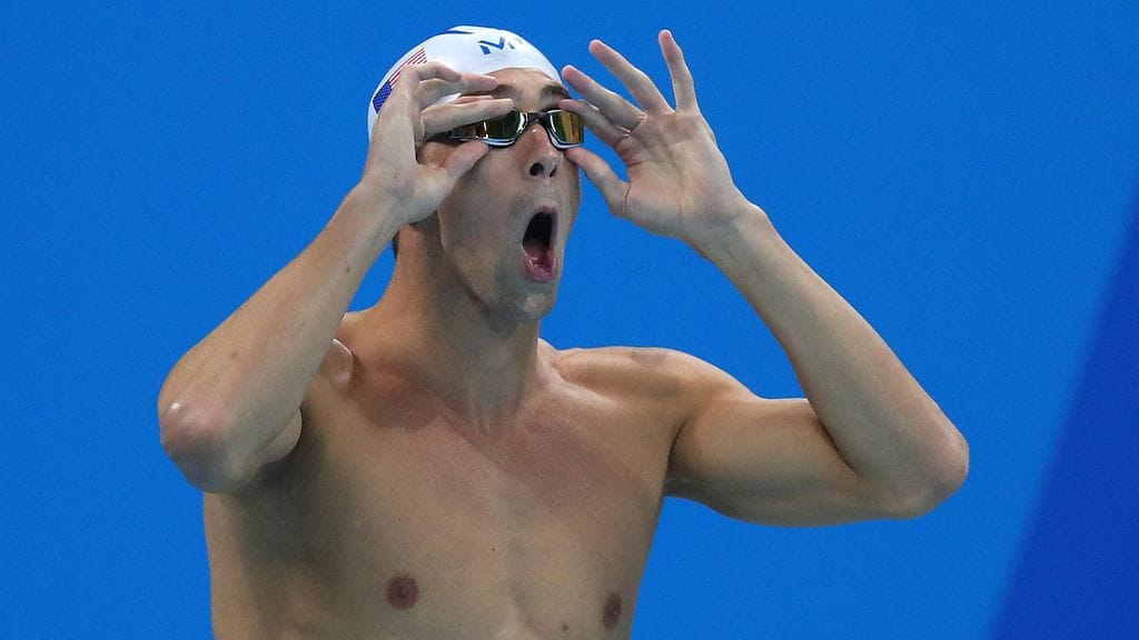 Michael Phelps tähyää lisää dollareita.