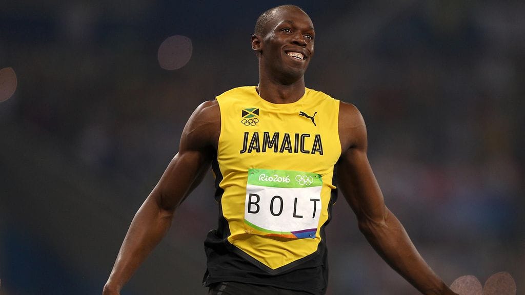 Usain Boltilla oli syytä hymyyn olympiavälierässä.