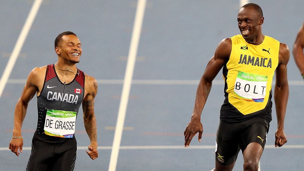 Usain Bolt (oik.) sai kelpo haasteen Andre De Grasselta.