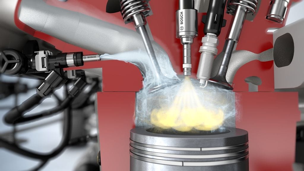 Järjestelmä ruiskuttaa bensiinin ohessa tislattua vettä.