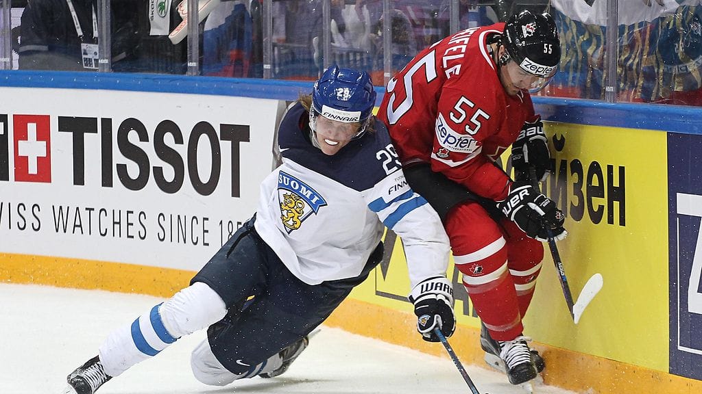 Patrik Laine ja Mark Scheifele kohtasivat jo kevään MM-kisoissa. Uusi kohtaaminen on ensi yönä.