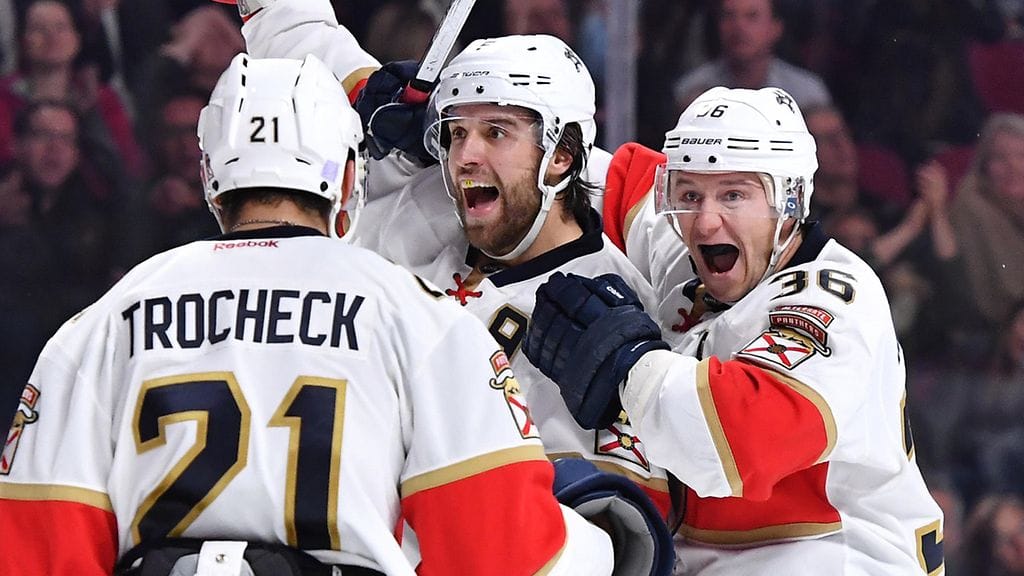 Jussi Jokinen ja Aaron Ekblad juhlimassa jatkoaikamaalia