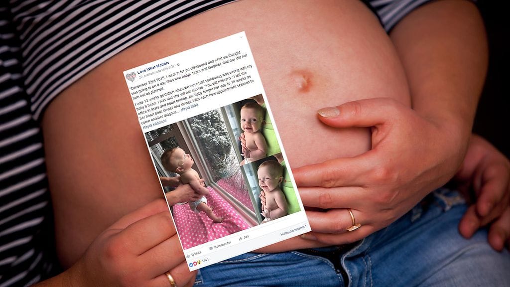 Vauva, jonka ei pitänyt selvitä elossa, nauttii nyt ensilumen katselemisesta.