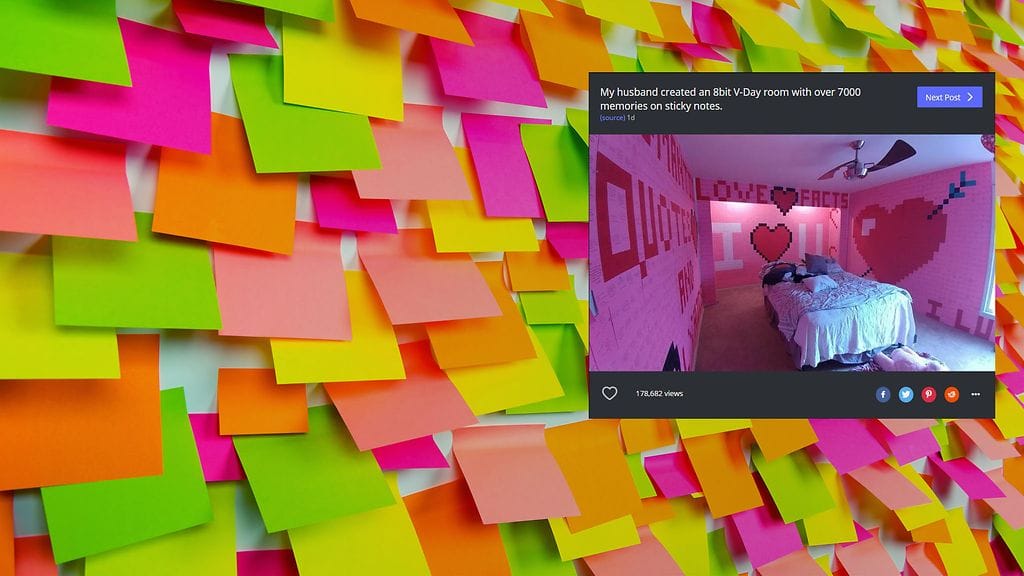 Eriväriset Post-it-laput muodostavat huoneen seinälle sydämiä ja sanoja.