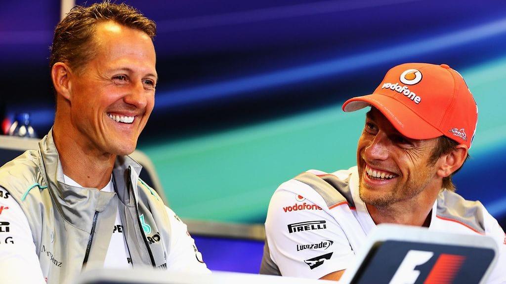 Michael Schumacher ja Jenson Button Belgian GP:ssä 2012.