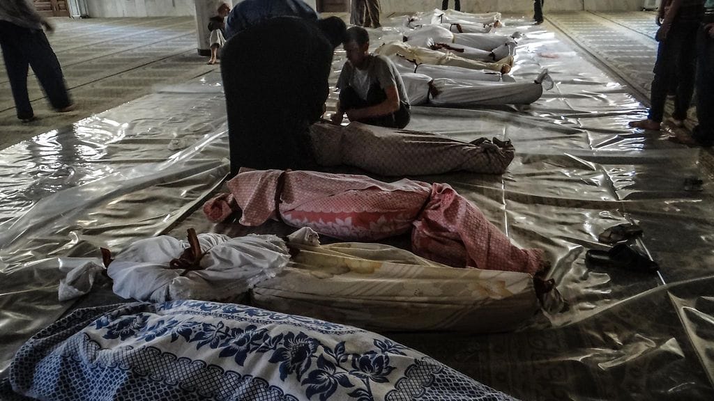 Epäillyn kemiallisen iskun uhreja Syyriassa vuonna 2012.