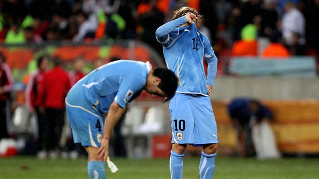 Jorge Fucile ja Diego Forlan, kuva: Joern Pollex/Getty Images