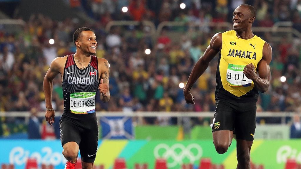 Andre De Grasse ja Usain Bolt kujeilivat 200 metrin olympiavälierässä Riossa viime kesänä.
