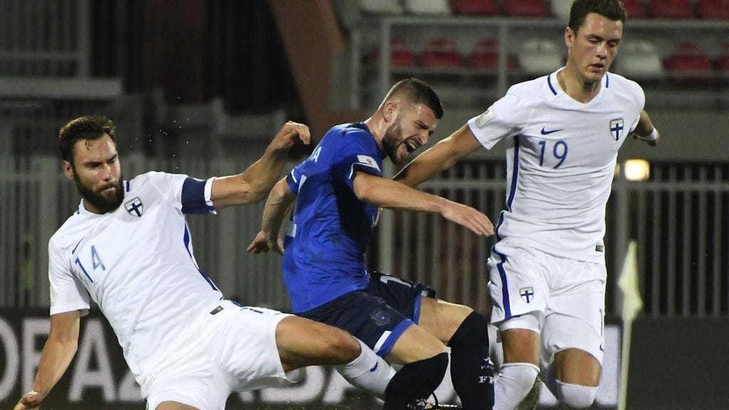 Tim Sparv ja Thomas Lam taistelevat Kosovon Valon Berishan kanssa