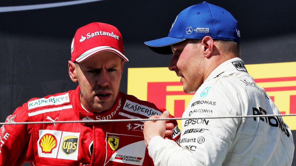 Sebastian Vettel (vas.) on MM-sarjassa toisena, Valtteri Bottaksen edellä.