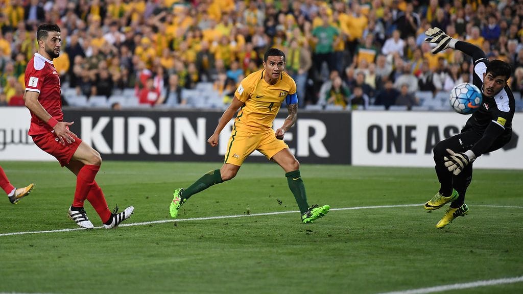 Australian Tim Cahill (keskellä) iski Syyriaa vastaan kaksi maalia.