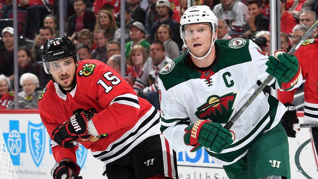 Mikko Koivu (oik.) johdatti Minnesotan voittoon.