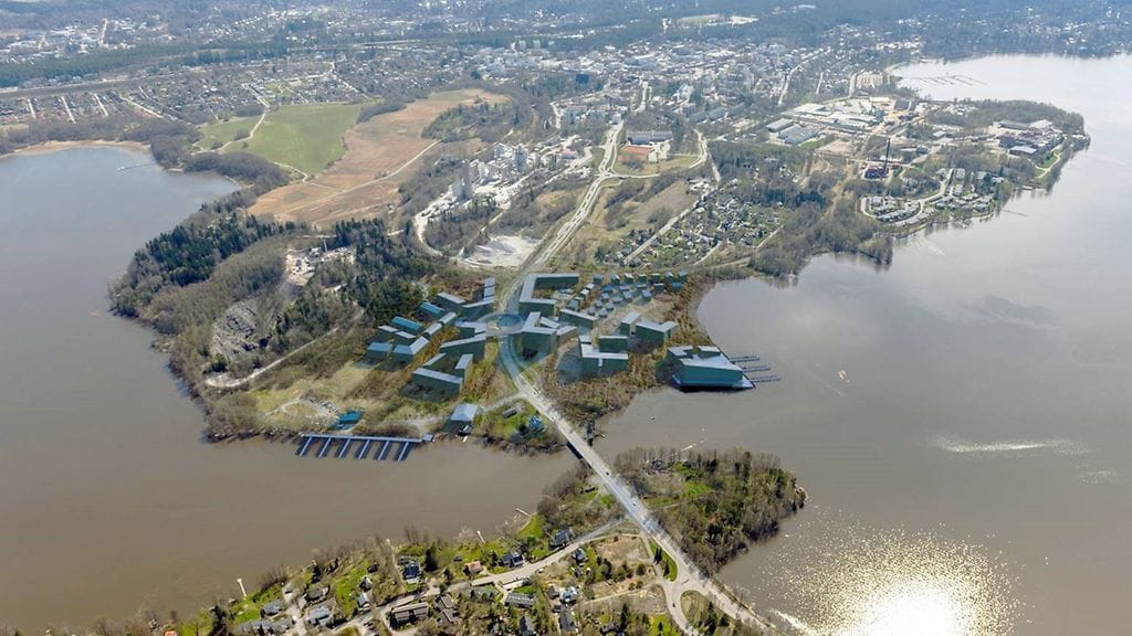 Havainnekuva Lohjan Asuntomessualueesta niemen kärjessä. Siniset talot on lisätty kuvaan yhtenä mahdollisena ratkaisuna.