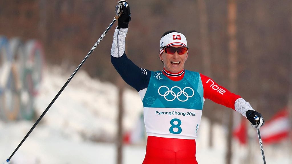 Marit Björgen voitti yhdistelmähiihdosta olympiahopeaa.