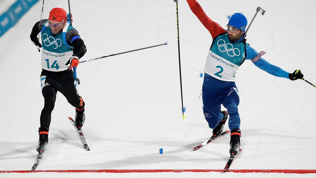 Martin Fourcade (oik.) kurotti olympiakultaan.