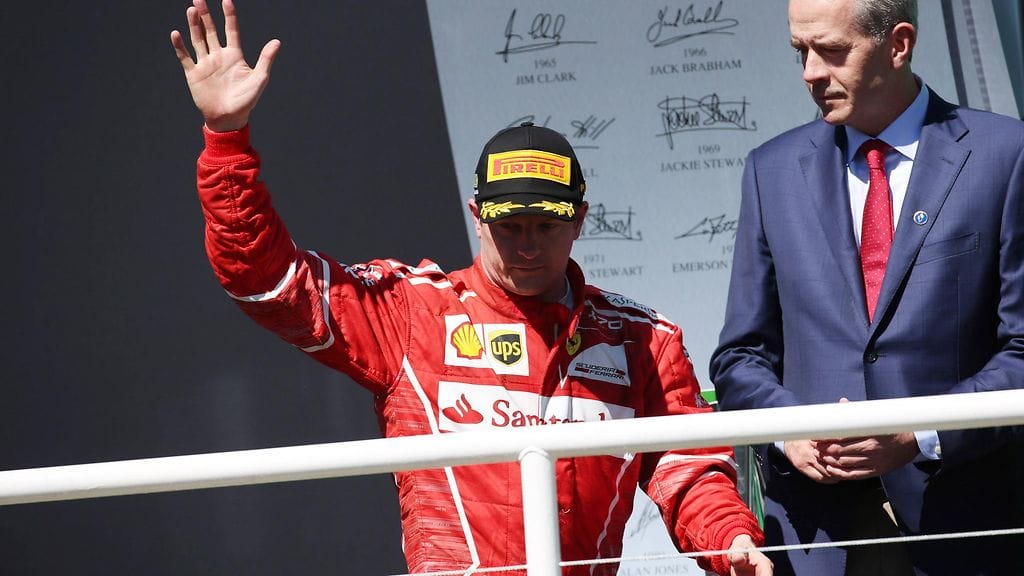 Kimi Räikkönen palkintopallilla Brasilian GP:ssä viime kaudella.