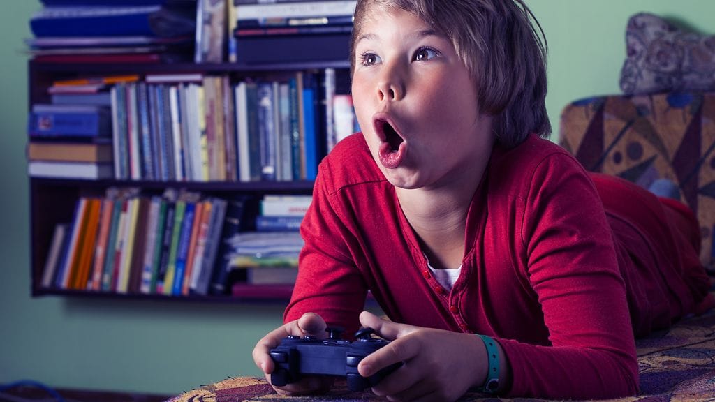 Play Station 4 -konsolin uusi päivitys mahdollistaa lapsen pelaamisen paremman kontrolloinnin. Kuvituskuva.