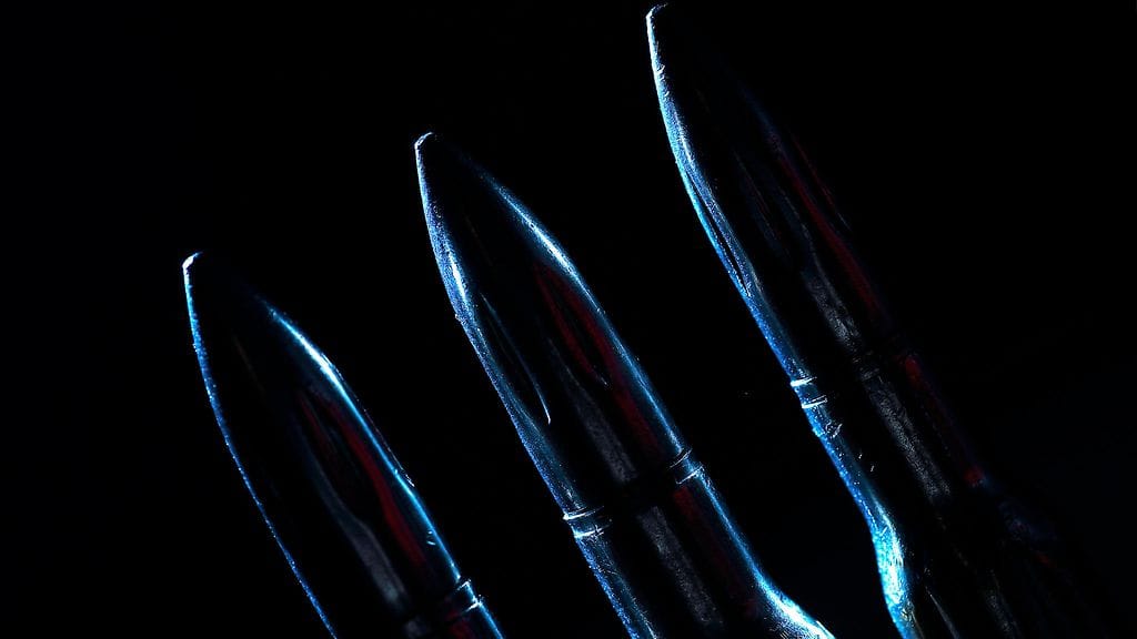 Kuvituskuvassa kiväärin patruunoita.