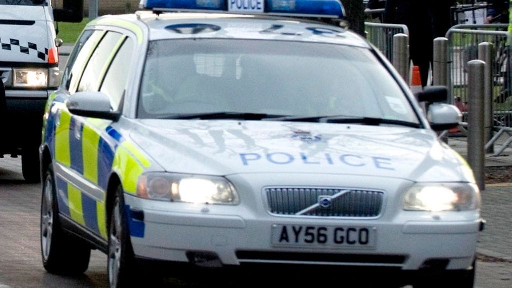 Kuvituskuvassa brittiläinen poliisiauto.