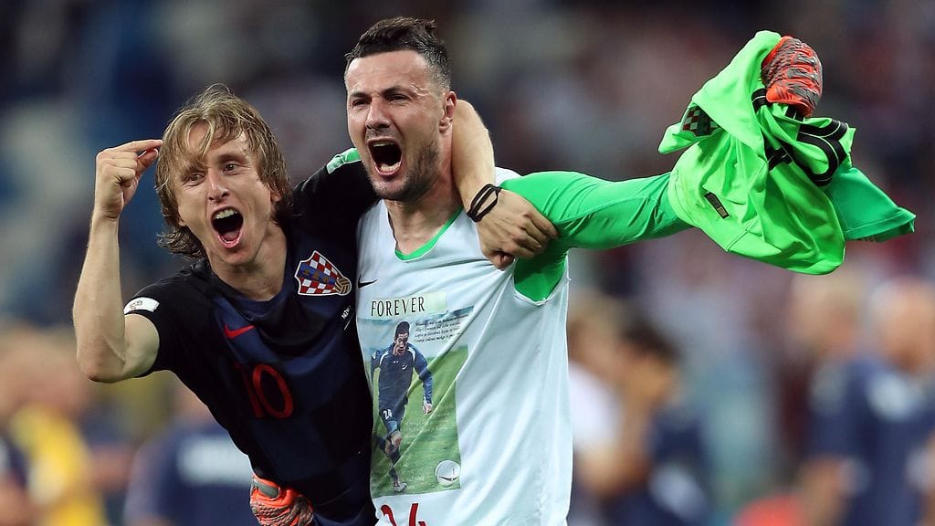 Kroatian Luka Modric ja Danijel Subasic.