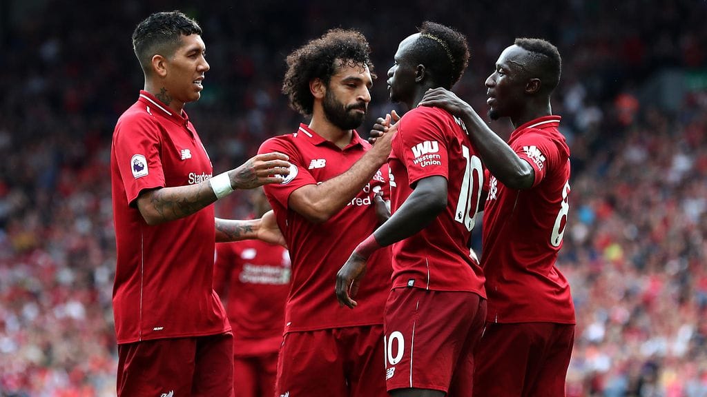 Liverpoolin hyökkäyskolmikko Roberto Firmino (vasemmalla), Mohamed Salah (toinen vasemmalta) ja Sadio Mane (toinen oikealta) olivat heti esillä uuden kauden avausottelussa, kun Liverpool kaatoi West Hamin 4-0.