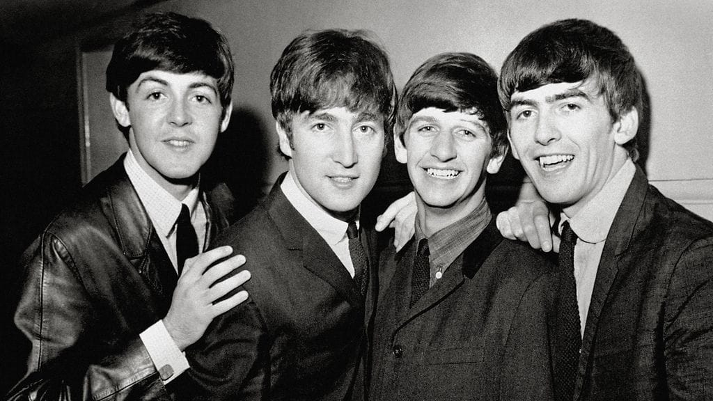 The Beatles -yhtyeen jäsenet Paul McCartney, John Lennon, Ringo Starr ja George Harrison vuonna 1963.