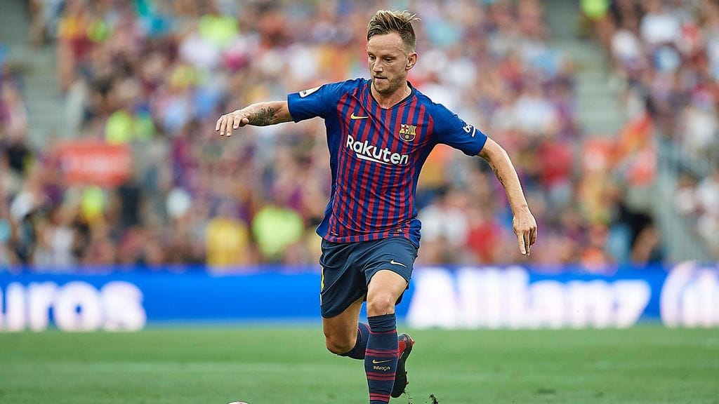 Ivan Rakiticin edustaman Barcelonan uudessa pelipaidassa raidat ovat vaihtuneet ruutuihin.