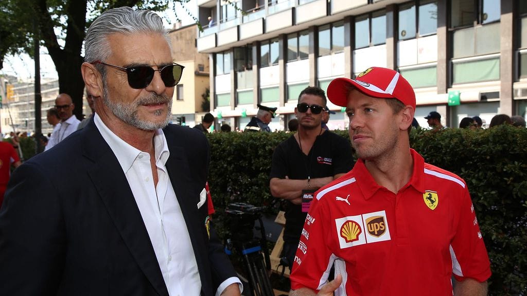 Maurizio Arrivabene ja Sebastian Vettel