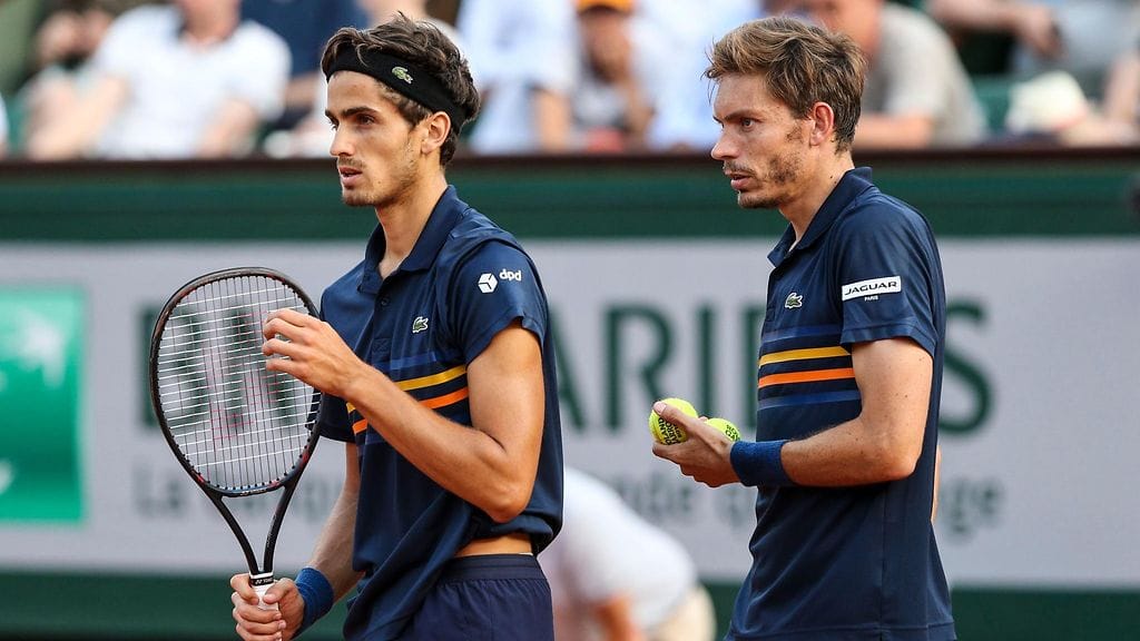 Herbert (vas.) ja Mahut (oik.) Ranskan avoimissa.