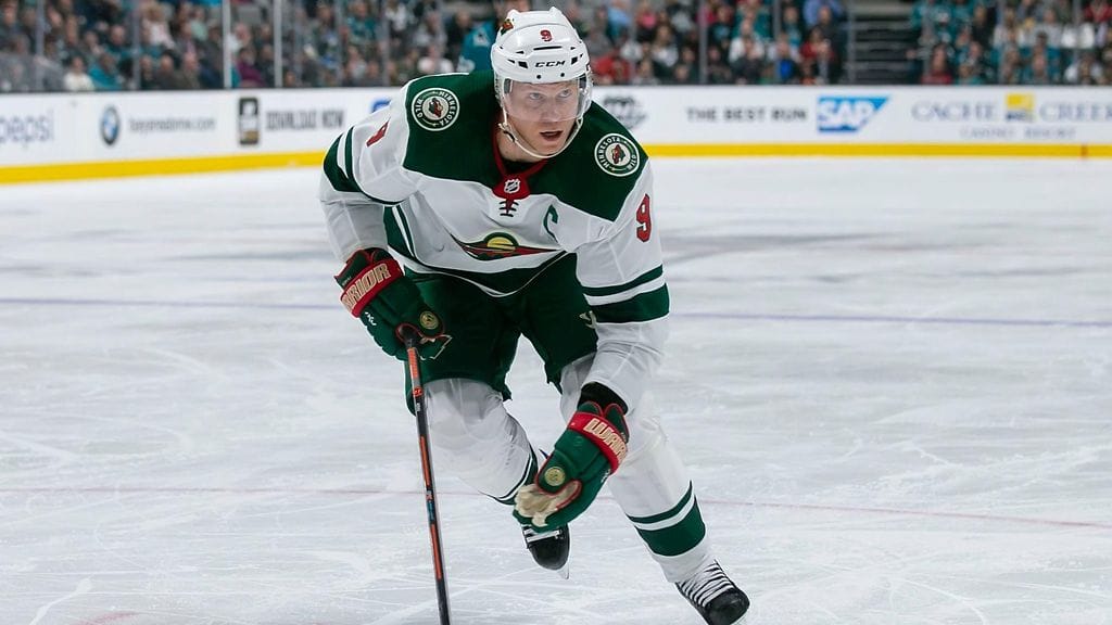 Mikko Koivu loukkaantui Mark Giordanon taklauksesta.