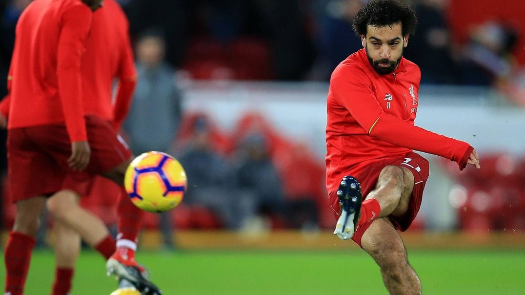 Kenet Liverpoolin Mo Salah saa vastaansa Mestarien liigan ensimmäisellä pudotuspelikierroksella.