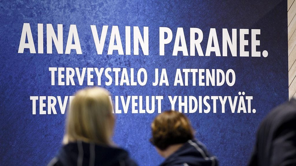 Terveystalon ja Attendo Terveyspalveluiden yrityskauppaa mainostava juliste Lääkäri 2019 -tapahtuman mediakierroksella Messukeskuksessa Helsingissä keskiviikkona 8. tammikutua 2019. LEHTIKUVA