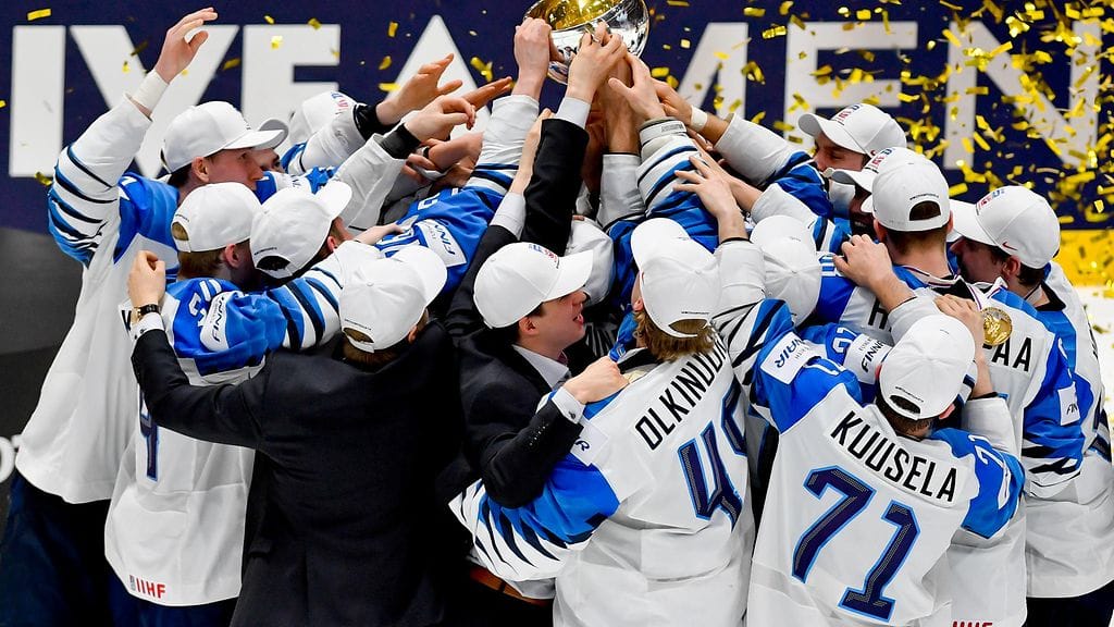 Leijonat juhlii maailmanmestaruutta.