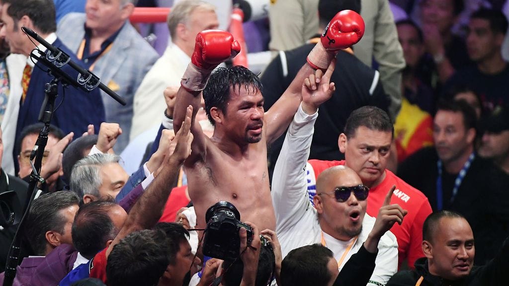 Manny Pacquiao juhli voittoa ja kuittasi komean palkkion.