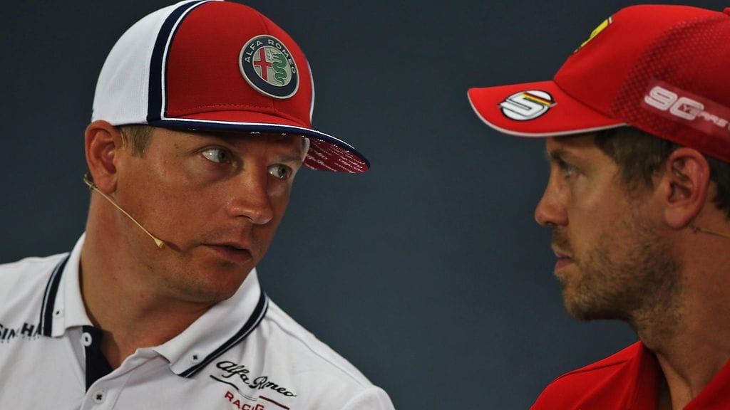Kimi Räikkönen ja Sebastian Vettel torstain lehdistötilaisuudessa Saksan Hockenheimissa.