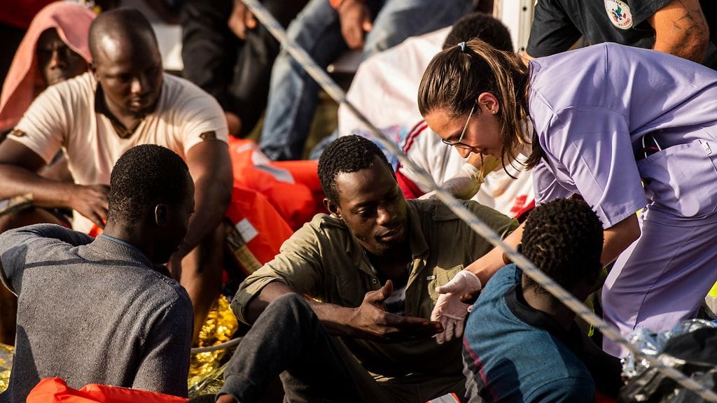 Kuvituskuvaa Libyan siirtolaisista viime kesältä.