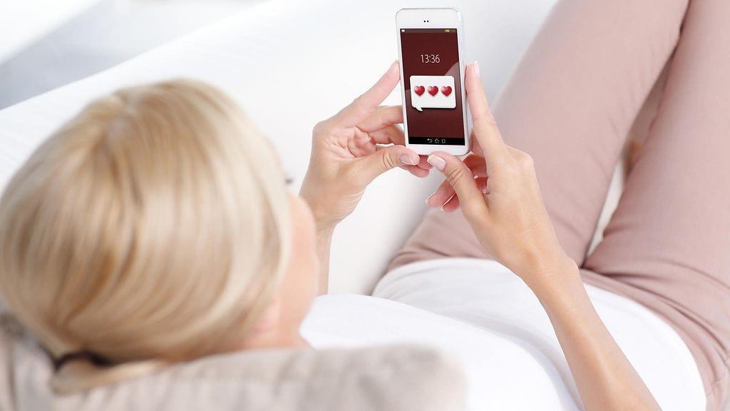 Emojeiden käyttö voi auttaa saamaan enemmän seksiä. Kuvituskuva.