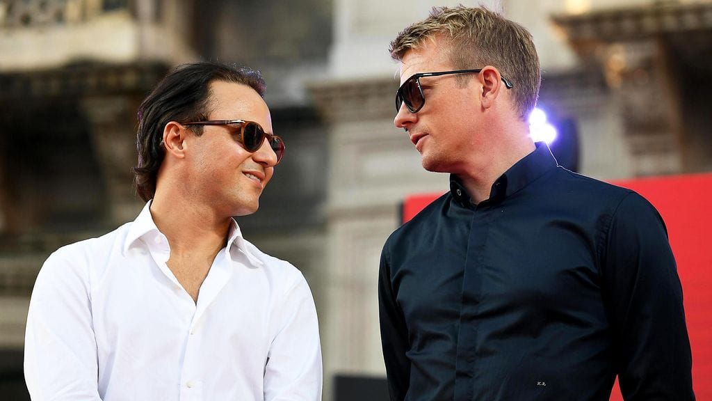 Kimi Räikkönen (oik.) ja Felipe Massa Ferrarin juhlallisuuksissa.