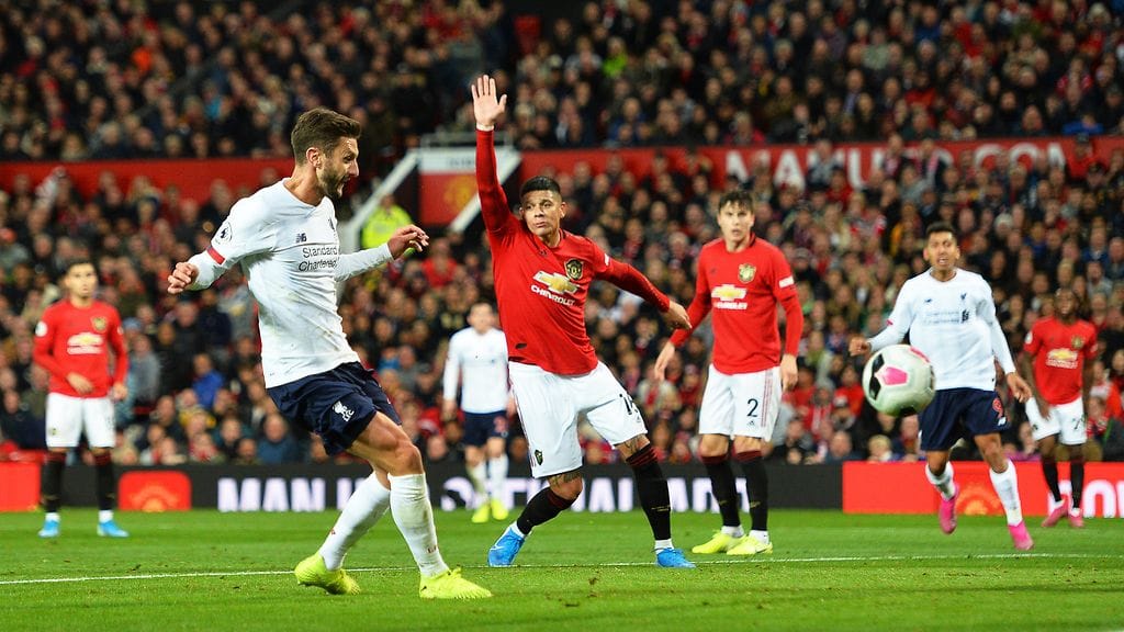 Adam Lallana (vas.) iski Liverpoolin 1-1-tasoituksen toisella puoliajalla.