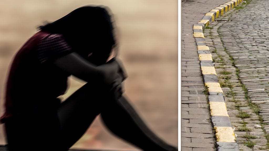 Ihmiset kulkivat ohi, vaikka nuori tyttö makasi maassa helmikuisena iltana. Kuvituskuva.