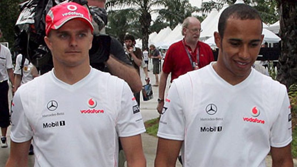 Heikki Kovalainen, Lewis Hamilton, kuva: EPA/ROLAND WEIHRAUCH