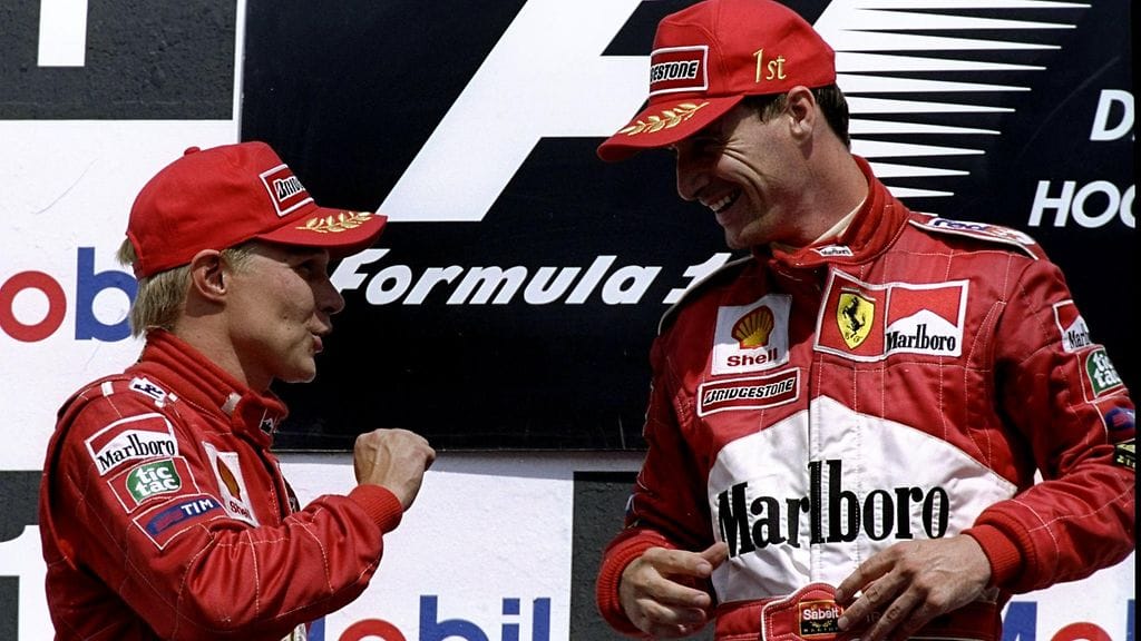 Mika Salo ja Eddie Irvine olivat tallikaveruksia Ferrarilla kaudella 1999.
