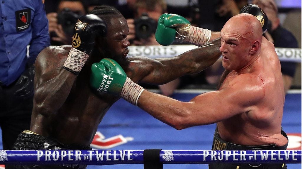 Tyson Fury (oik.) ja Deontay Wilder eivät kohdanne hetkeen.