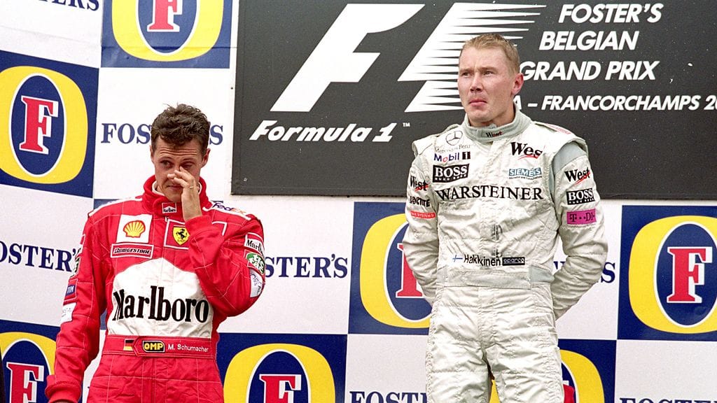 Mika Häkkinen ja Michael Schumacher Belgian GP:n palkintopallilla 2000