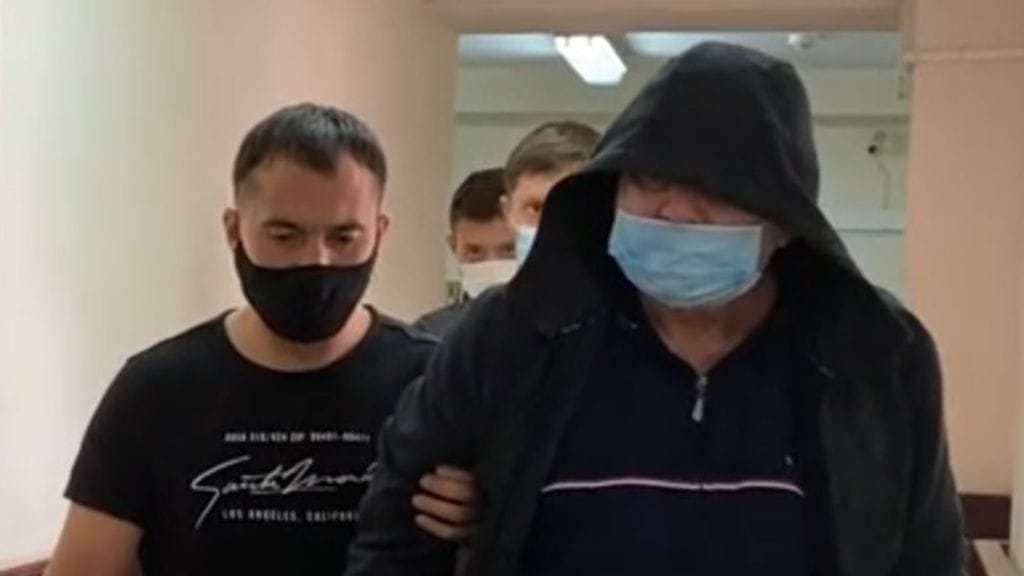 Aleksander Kuranovia (oikealla) epäillään maanpetoksesta.