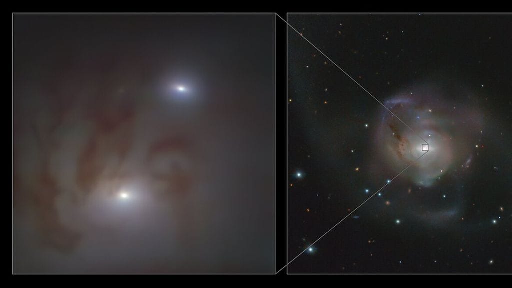 Kuvassa mustat aukot näyttävät kahdelta sumupisteeltä, sillä niiden ympärillä on paljon tähtiä, kertoo Tähdet ja avaruus -lehti.