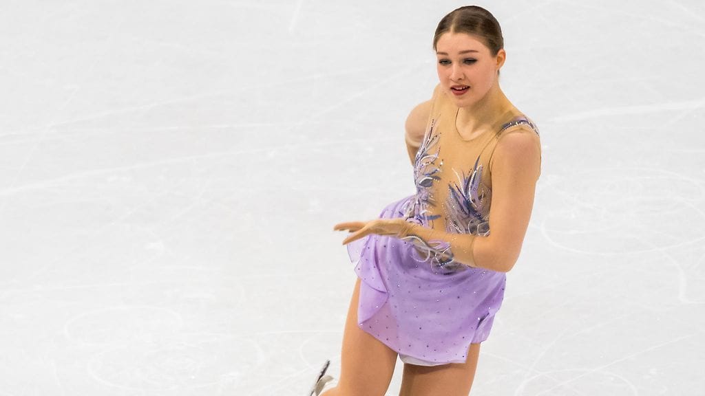 Jenni Saarisen taustalla on monipuolinen valmennustiimi Suomessa ja Saksassa.