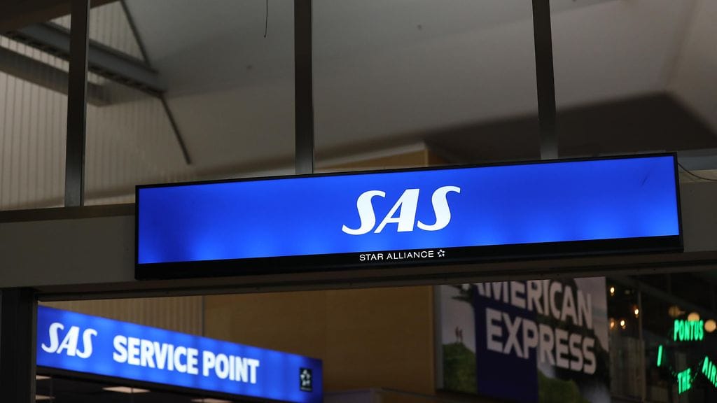 Kuvituskuva. Salamatkustamisesta tuomittu venäläismies kulki portin läpi huomaamatta ja nousi Scandinavian Airlinesin lennolle Los Angelesiin.